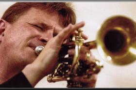 Geoff playing Bix's horn,Davenport,Iowa,August 2006. Photo courtesy of Quad City Times newspaper